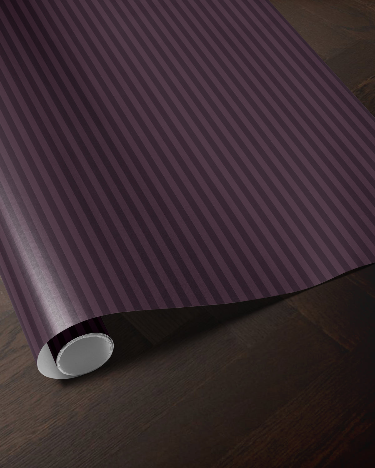 Plum striped wrapping paper roll showing the classic vertical stripe pattern