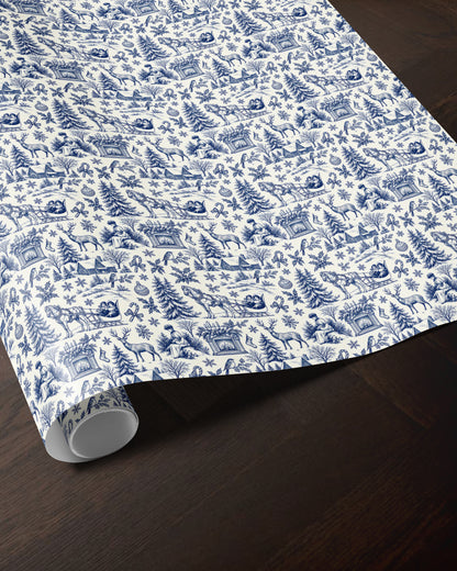 Blue woodland toile wrapping paper roll with a vintage forest pattern