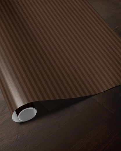 Brown striped wrapping paper roll showing the classic vertical stripe pattern
