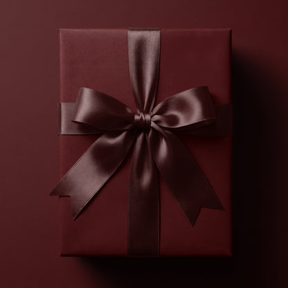 Solid burgundy red wrapping paper in a rich deep red tone by Mahomi Design