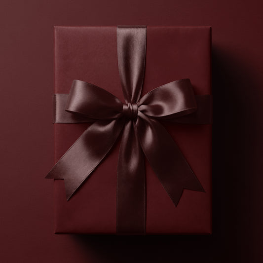 Solid burgundy red wrapping paper in a rich deep red tone by Mahomi Design