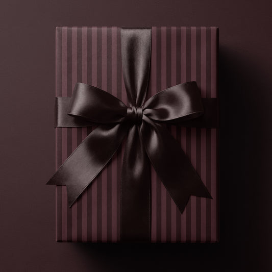Burgundy striped wrapping paper featuring classic vertical stripes in rich wine-red tones