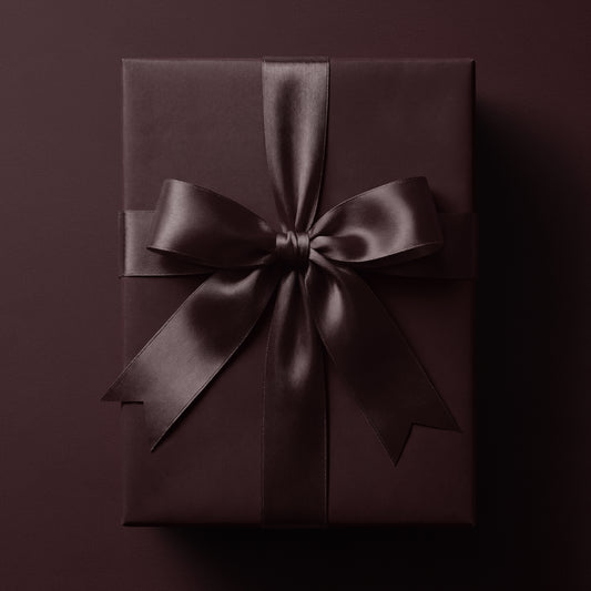 Solid dark burgundy wrapping paper in a rich deep burgundy tone by Mahomi Design