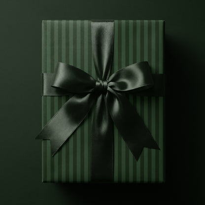 Dark green striped wrapping paper featuring classic vertical stripes in rich deep tones