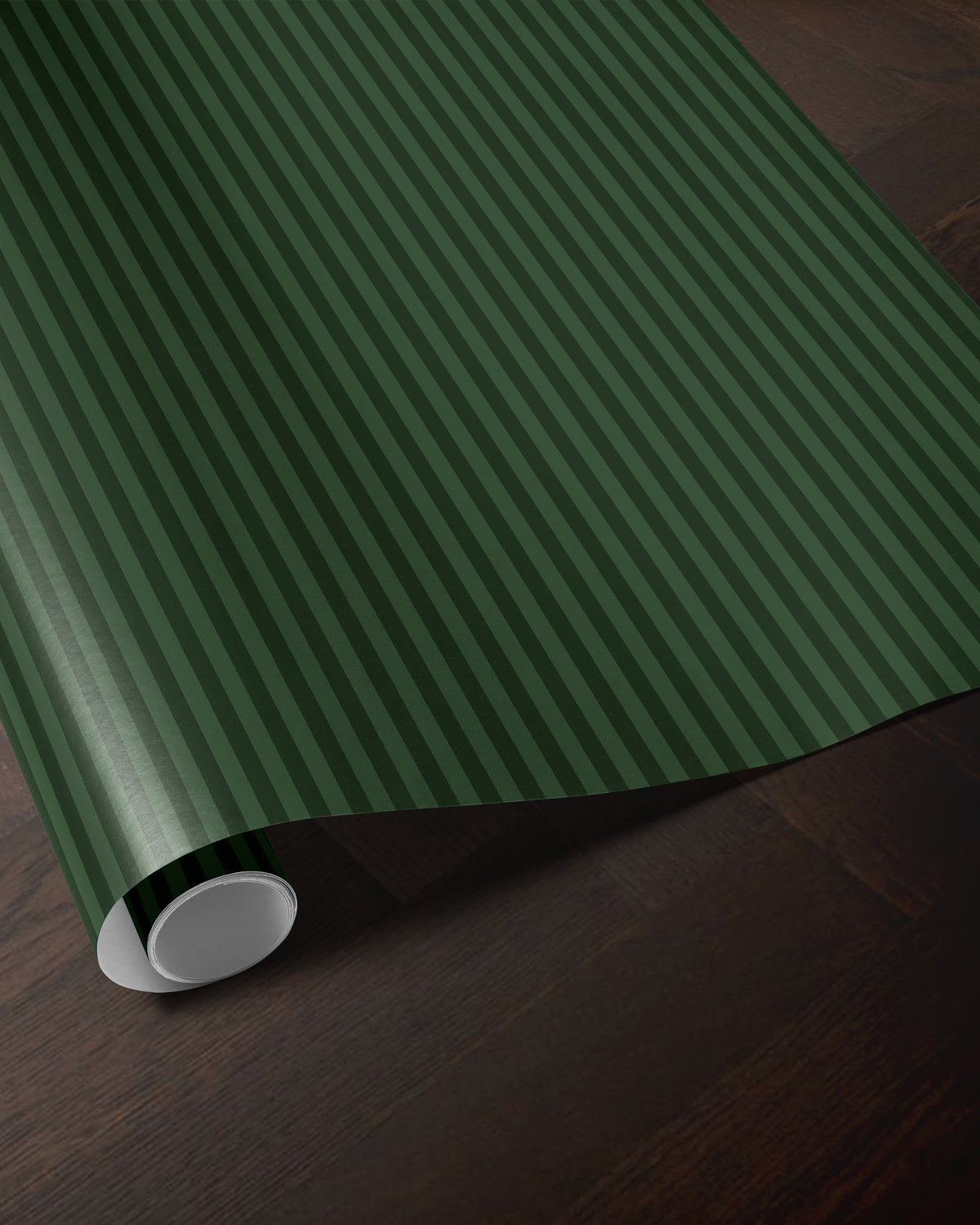 Dark green striped wrapping paper roll showing the classic vertical stripe pattern