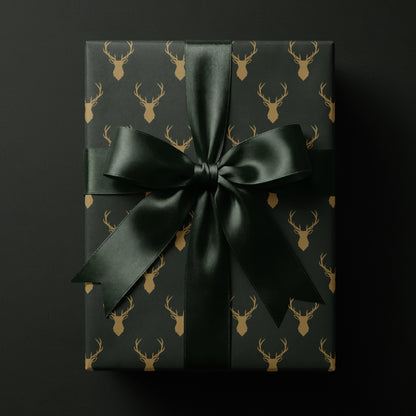 green reindeer wrapping paper featuring elegant golden antlers
