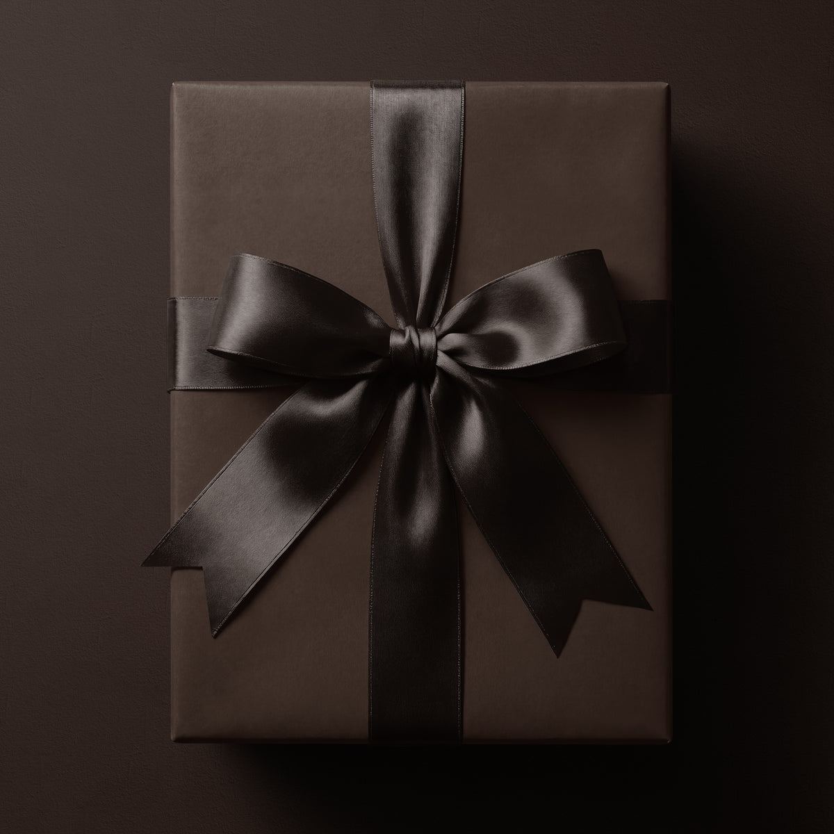 Solid matte brown wrapping paper in a rich deep brown tone, featuring a simple timeless design by Mahomi Design.
