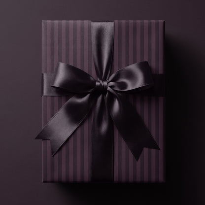 Plum striped wrapping paper featuring classic vertical stripes in rich deep tones