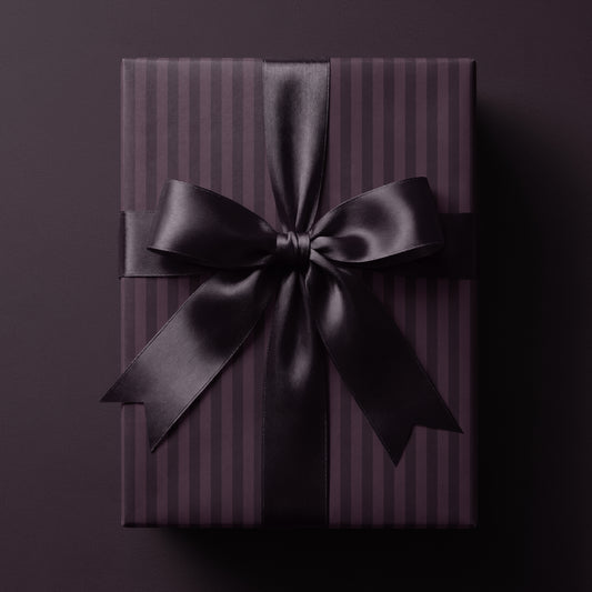 Plum striped wrapping paper featuring classic vertical stripes in rich deep tones
