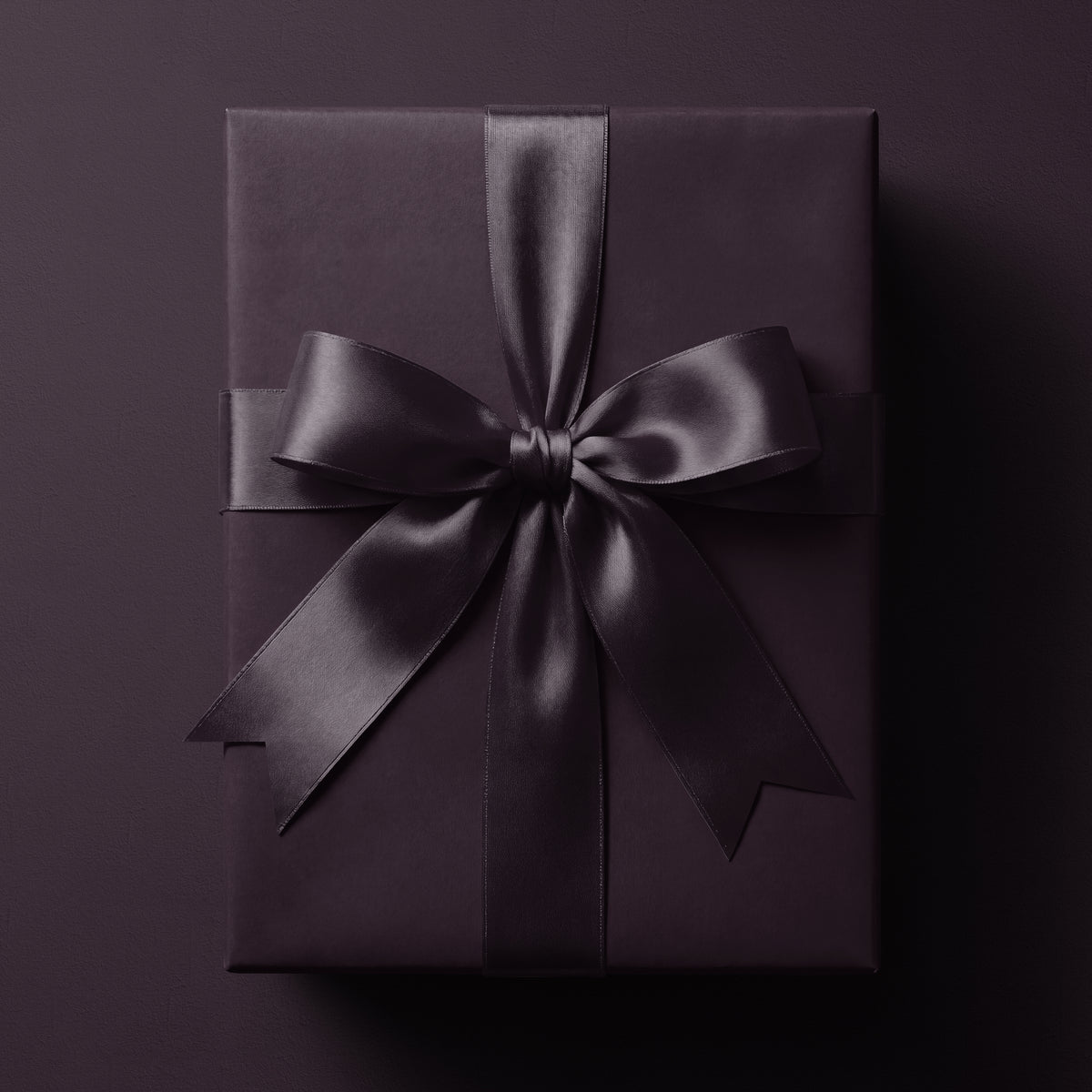 Solid plum wrapping paper in a rich deep purple tone by Mahomi Design
