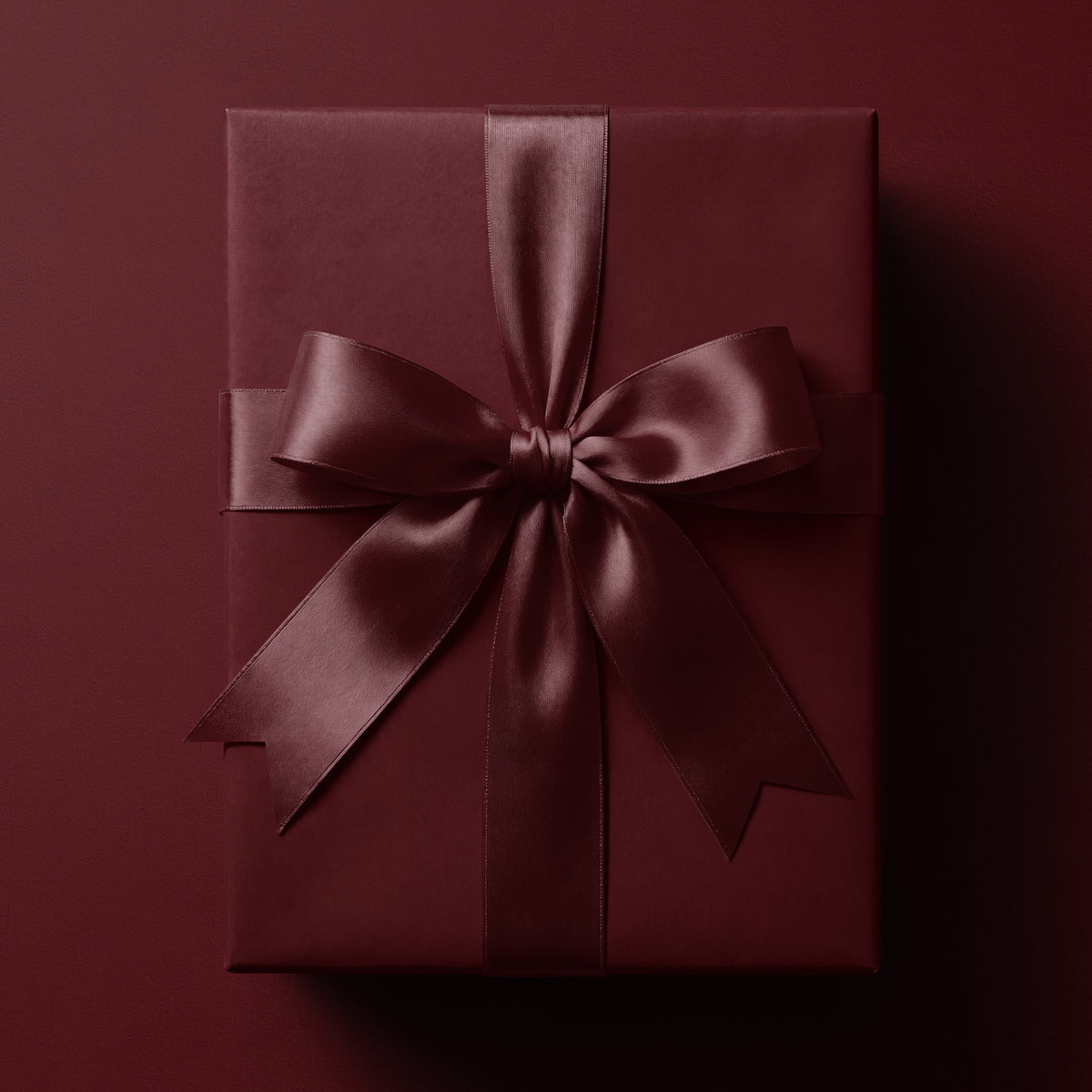Solid red merlot wrapping paper in a deep, rich red tone by Mahomi Design